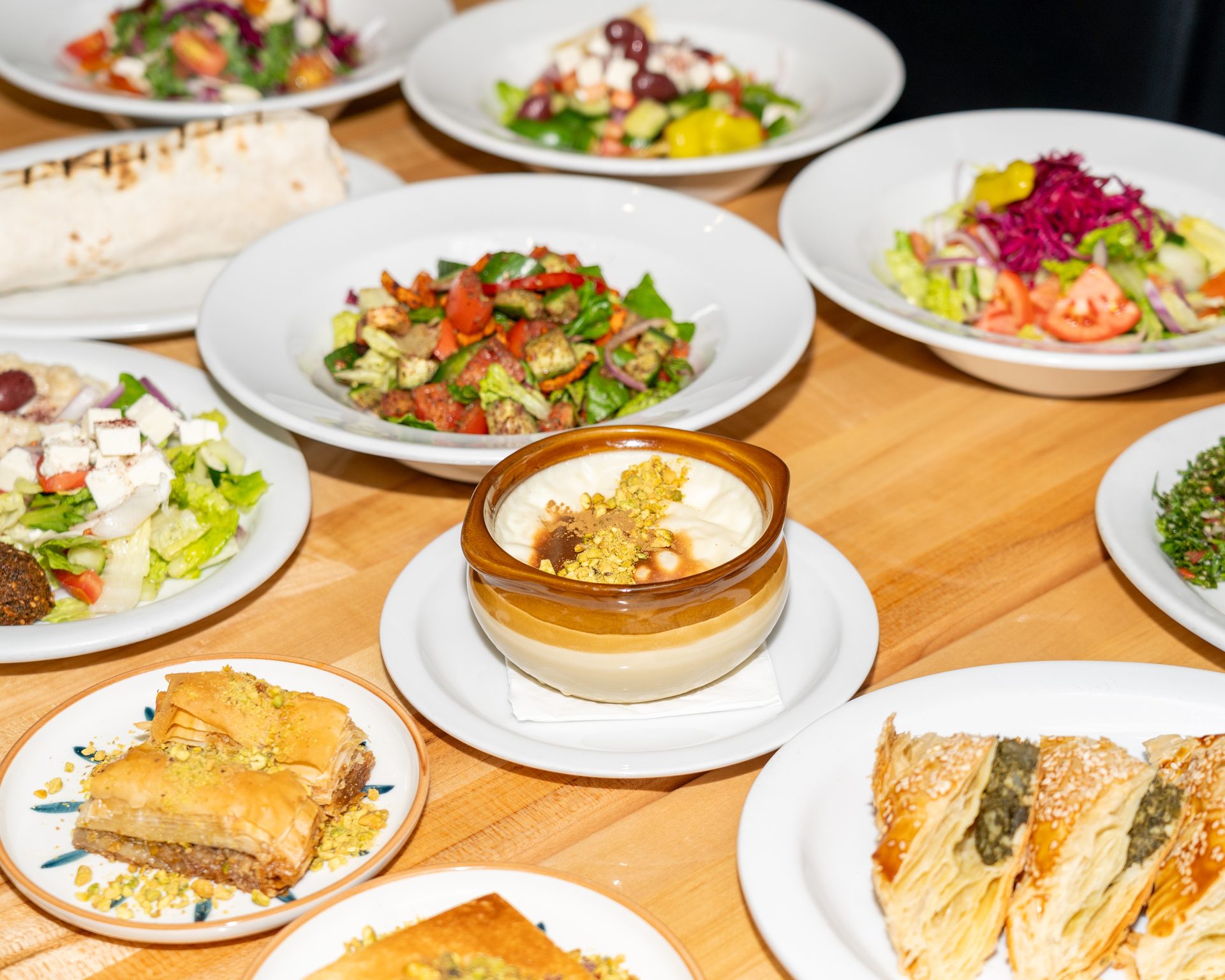 Hummus, baklava, plates, and more
